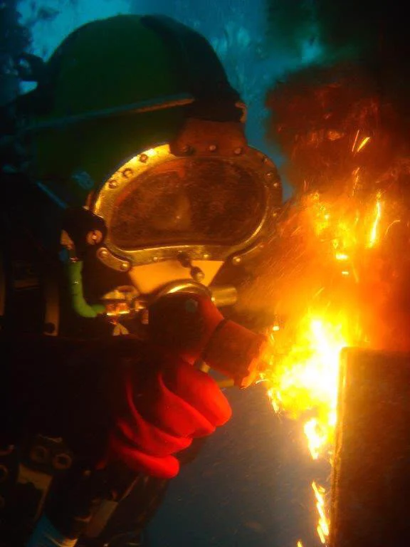 Diver performing underwater welding
