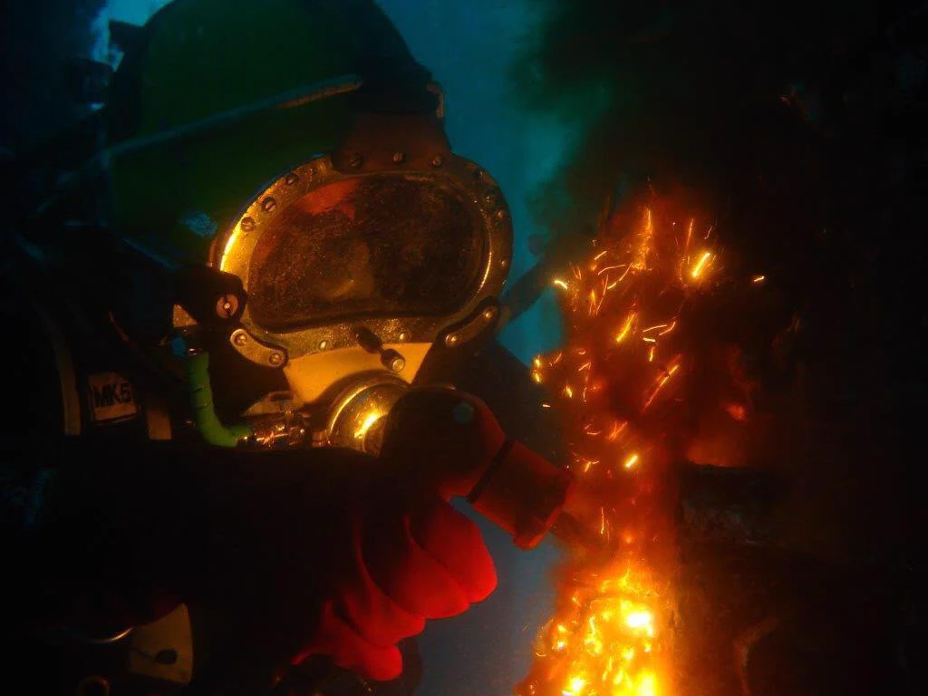 Diver performing underwater welding